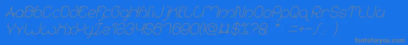 フォントkaritza Italic – 青い背景に灰色の文字
