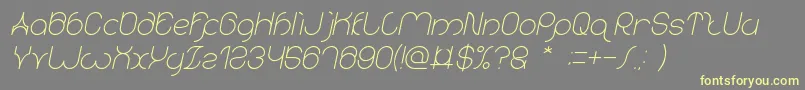 フォントkaritza Italic – 黄色のフォント、灰色の背景