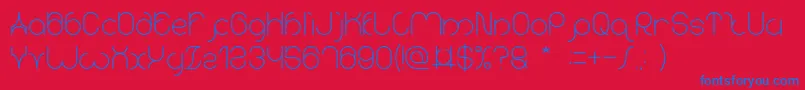 karitza Font – Blue Fonts on Red Background