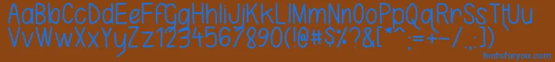 KarlaCamilla Font – Blue Fonts on Brown Background