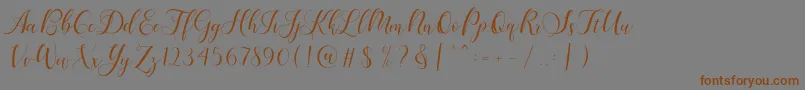 Karliyna Script-Schriftart – Braune Schriften auf grauem Hintergrund