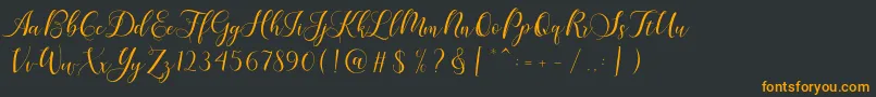 Karliyna Script-fontti – oranssit fontit mustalla taustalla