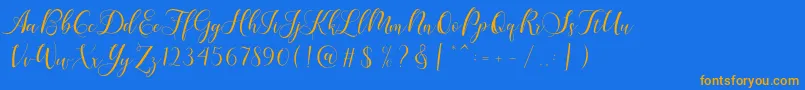 Karliyna Script Font – Orange Fonts on Blue Background