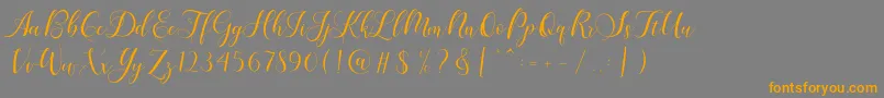 Karliyna Script-Schriftart – Orangefarbene Schriften auf grauem Hintergrund