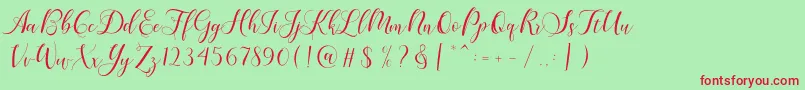 Karliyna Script-fontti – punaiset fontit vihreällä taustalla