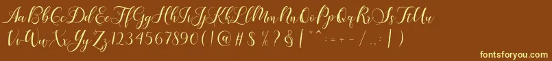 Karliyna Script-Schriftart – Gelbe Schriften auf braunem Hintergrund