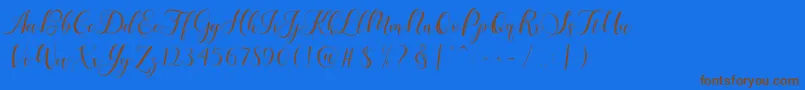 Fonte Karliyna Script – fontes marrons em um fundo azul