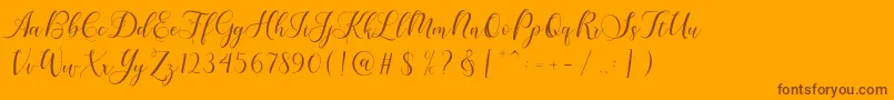 Fonte Karliyna Script – fontes marrons em um fundo laranja