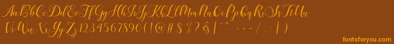 fuente Karliyna Script – Fuentes Naranjas Sobre Fondo Marrón