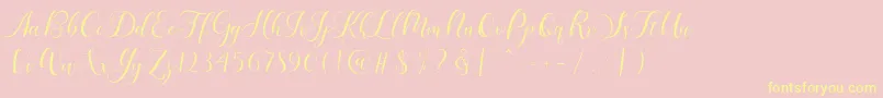 Karliyna Script Font – Yellow Fonts on Pink Background