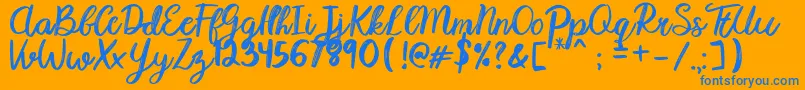 Karmany Regular-Schriftart – Blaue Schriften auf orangefarbenem Hintergrund