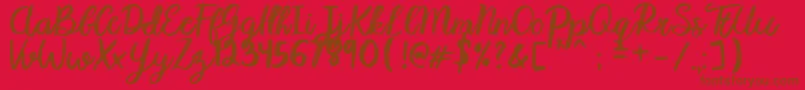 Karmany Regular-Schriftart – Braune Schriften auf rotem Hintergrund