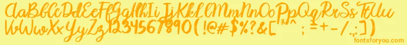 Karmany Regular Font – Orange Fonts on Yellow Background