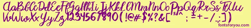 Karmany Regular Font – Purple Fonts on Yellow Background