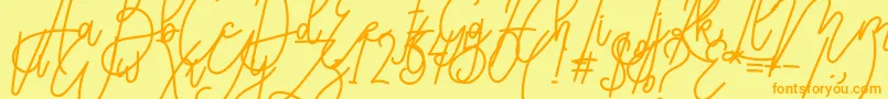 Karyland Font – Orange Fonts on Yellow Background