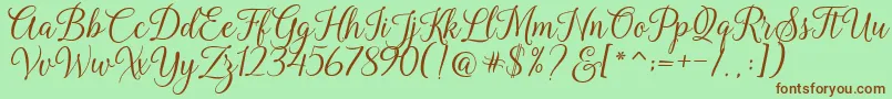 Kasandra Script Font – Brown Fonts on Green Background