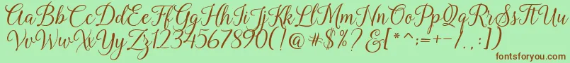 Fonte Kasandra Script – fontes marrons em um fundo verde