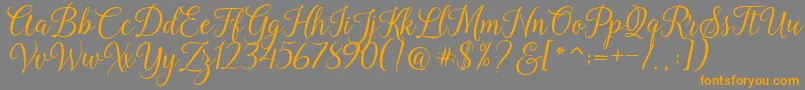 Kasandra Script Font – Orange Fonts on Gray Background