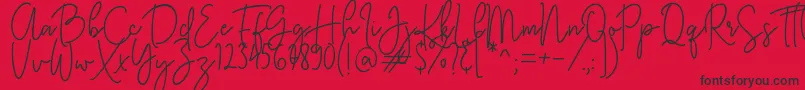 Czcionka KastingScript – czarne czcionki na czerwonym tle