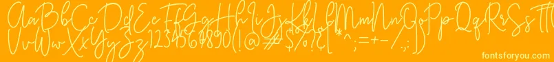 KastingScript Font – Yellow Fonts on Orange Background