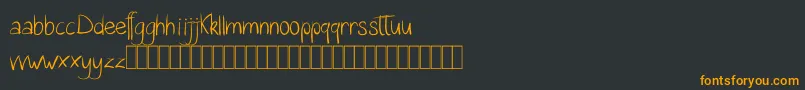 Шрифт Katalyn Demo – оранжевые шрифты на чёрном фоне