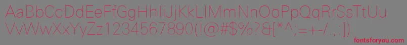 UniversNextProUltralight Font – Red Fonts on Gray Background