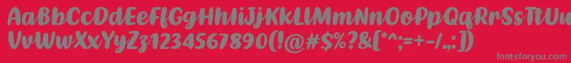 Fonte Kathen Font by Situjuh 7NTypes – fontes cinzas em um fundo vermelho