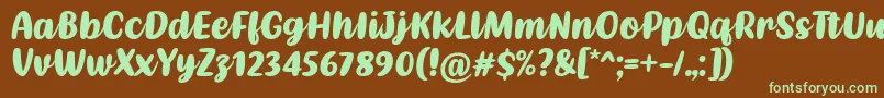 フォントKathen Font by Situjuh 7NTypes – 緑色の文字が茶色の背景にあります。