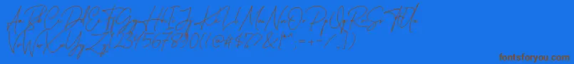 Katherine Free-Schriftart – Braune Schriften auf blauem Hintergrund