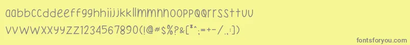 フォントKatherine Handwriting – 黄色の背景に灰色の文字