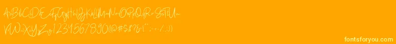 Kathlyn Font – Yellow Fonts on Orange Background