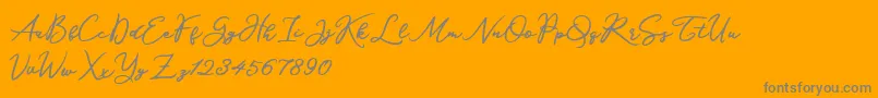 Katrine Holland-Schriftart – Graue Schriften auf orangefarbenem Hintergrund