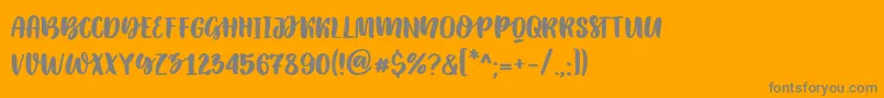 Katsia Jazwinska   Elowen Caps Font – Gray Fonts on Orange Background