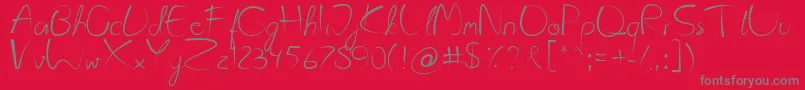Kattyland Font – Gray Fonts on Red Background
