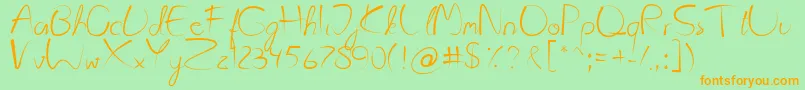Kattyland Font – Orange Fonts on Green Background