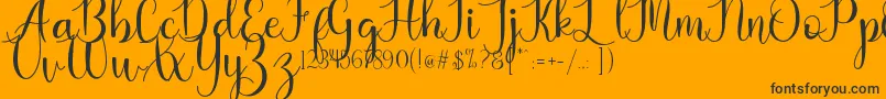 Kaylia Font – Black Fonts on Orange Background