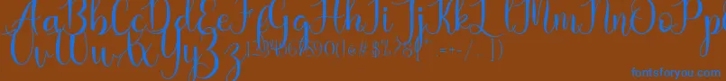 Kaylia-Schriftart – Blaue Schriften auf braunem Hintergrund