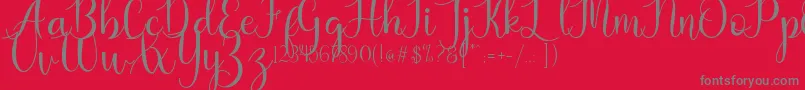 Kaylia Font – Gray Fonts on Red Background