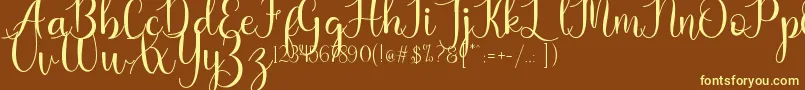 Kaylia Font – Yellow Fonts on Brown Background