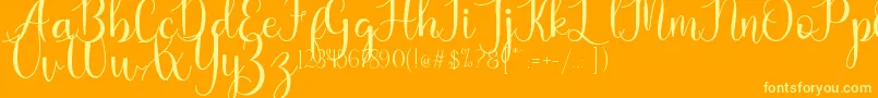 Kaylia Font – Yellow Fonts on Orange Background
