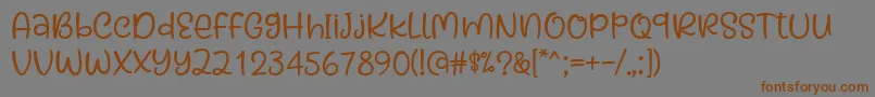 フォントKaylonick Font by Situjuh 7NTypes – 茶色の文字が灰色の背景にあります。