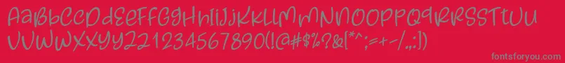 フォントKayskew October Eleven Font by Situjuh 7NTypes – 赤い背景に灰色の文字