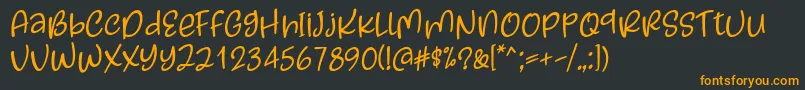 フォントKayskew October Eleven Font by Situjuh 7NTypes – 黒い背景にオレンジの文字