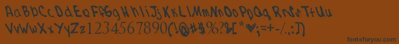 kdizzle Font – Black Fonts on Brown Background
