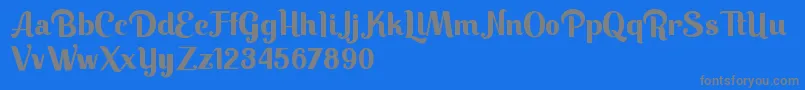 Keilla-fontti – harmaat kirjasimet sinisellä taustalla