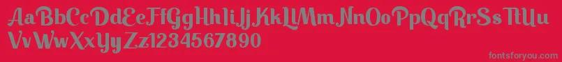 Keilla-Schriftart – Graue Schriften auf rotem Hintergrund