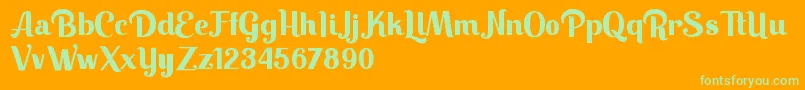 Keilla-Schriftart – Grüne Schriften auf orangefarbenem Hintergrund