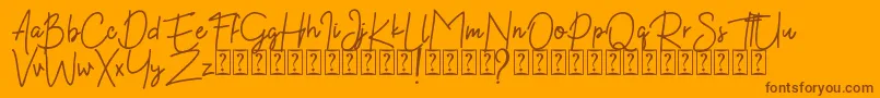 Kekasih Font DEMO Font – Brown Fonts on Orange Background