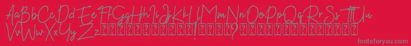 フォントKekasih Font DEMO – 赤い背景に灰色の文字