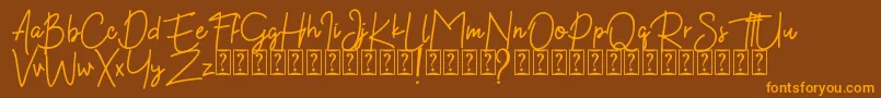 Kekasih Font DEMO Font – Orange Fonts on Brown Background